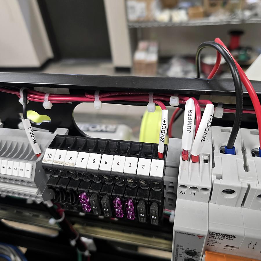 Numbered terminal strip with fused disconnects and labeled jumpers