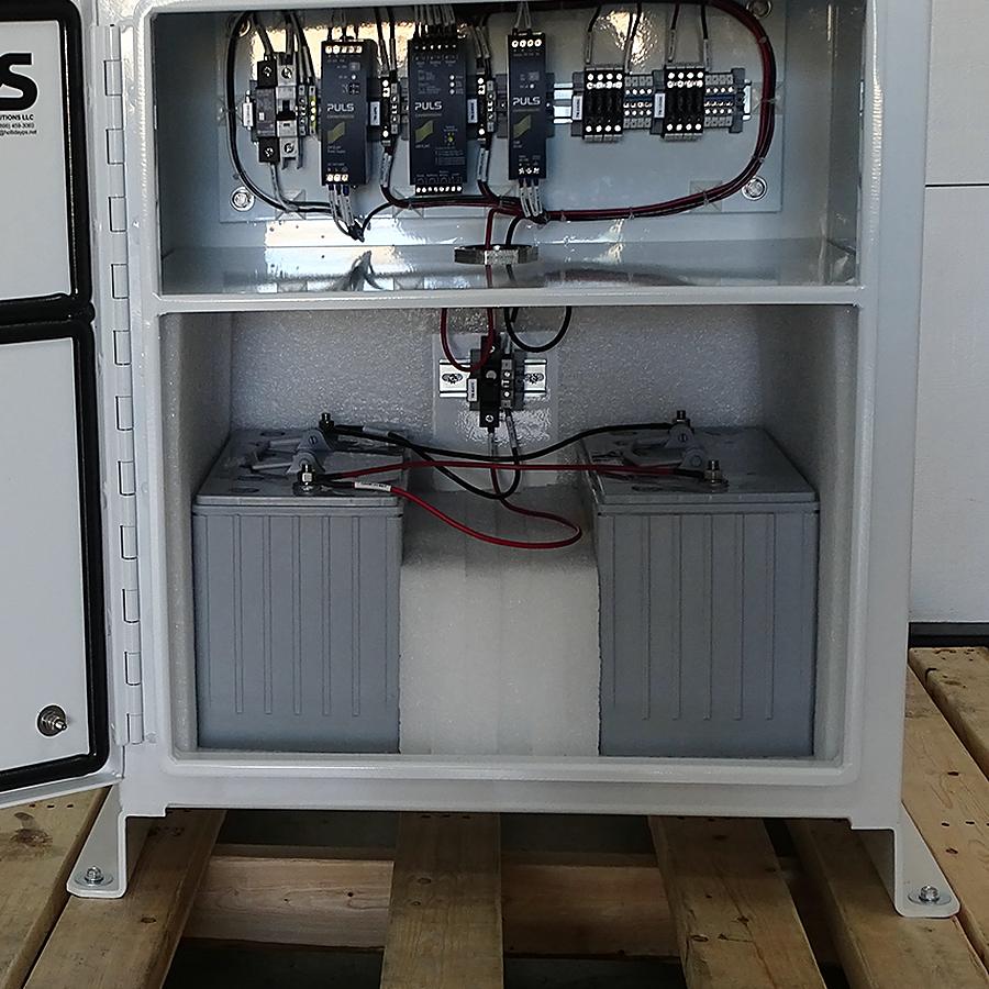 DC UPS enclosure with battery bank and charger